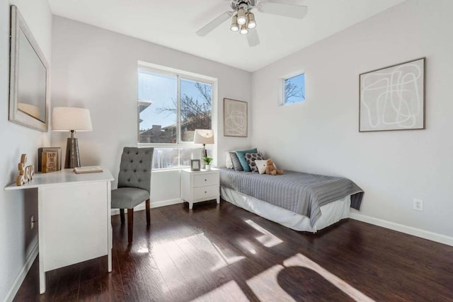 bedroom featuring ceiling fan and dark hardwood / wood-style flooring