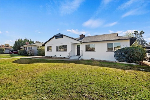 view of front of home with a front lawn