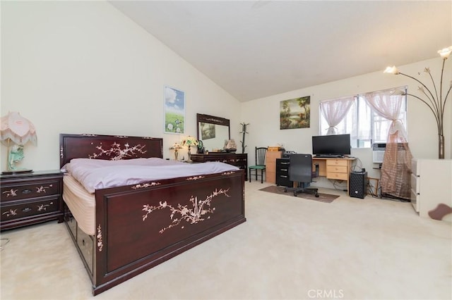 carpeted bedroom with vaulted ceiling