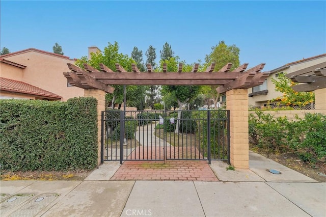 view of gate with a pergola