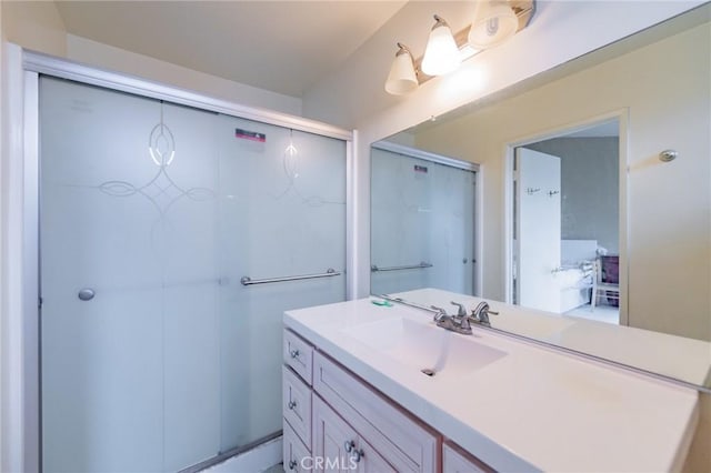 bathroom with vanity and an enclosed shower