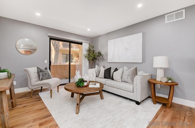 living room featuring light wood-type flooring