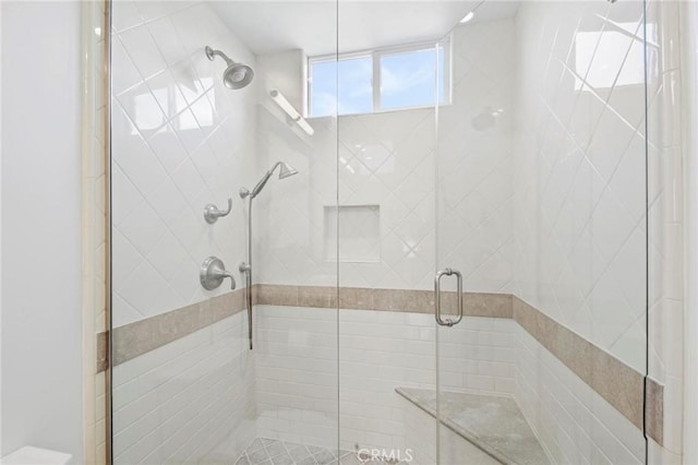 bathroom featuring walk in shower