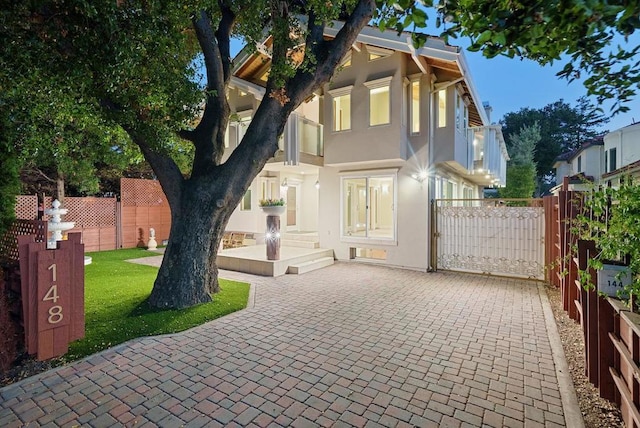 rear view of house with a patio