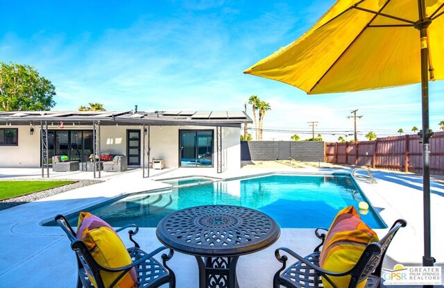 view of pool with a patio