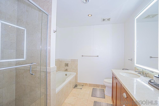 full bathroom featuring toilet, tile patterned floors, vanity, and plus walk in shower