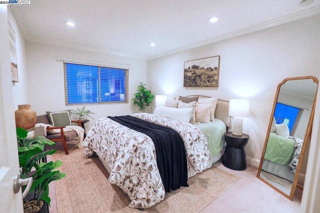 carpeted bedroom featuring crown molding