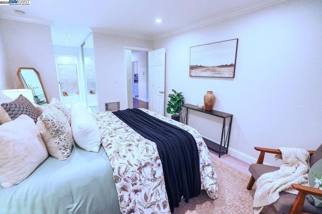 bedroom featuring crown molding