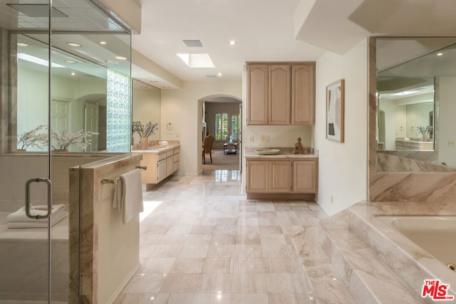 interior space featuring light brown cabinets