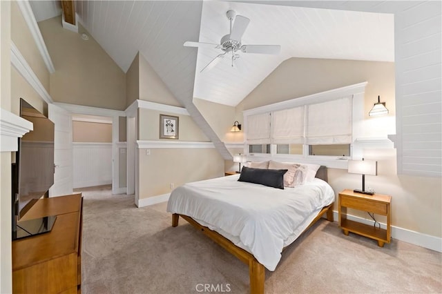 carpeted bedroom featuring vaulted ceiling and ceiling fan