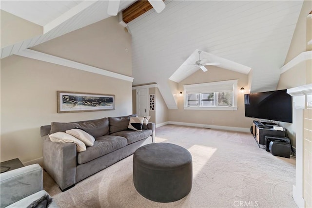 living room featuring ceiling fan, light colored carpet, and vaulted ceiling with beams