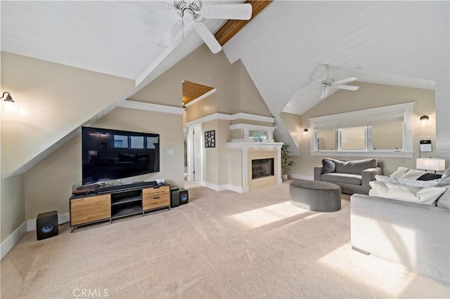 carpeted living room with high vaulted ceiling, beam ceiling, and ceiling fan