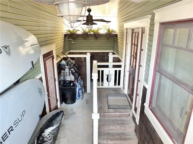 exterior space featuring ceiling fan