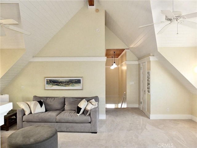 living room with ceiling fan, light colored carpet, and vaulted ceiling with beams