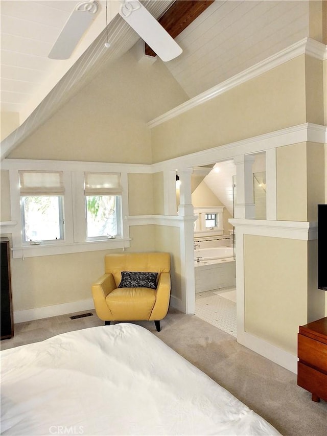 bedroom featuring ceiling fan, light carpet, beamed ceiling, and high vaulted ceiling