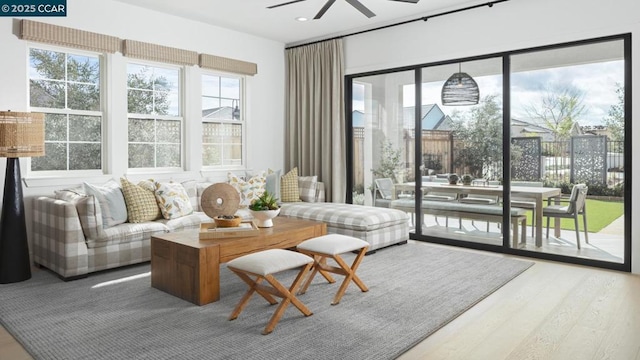 sunroom / solarium with ceiling fan