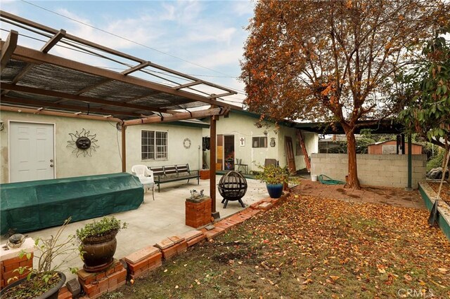 exterior space featuring a pergola