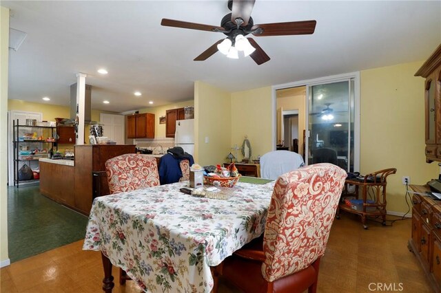 dining room with ceiling fan