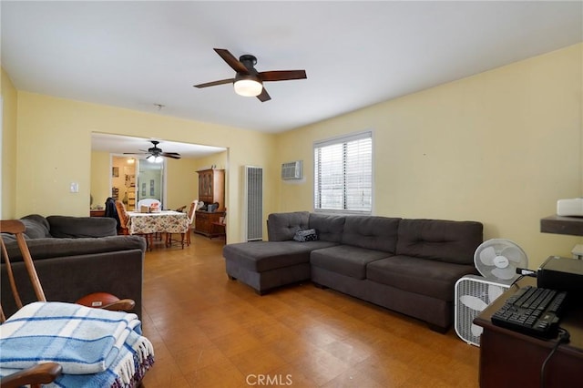 living room with ceiling fan