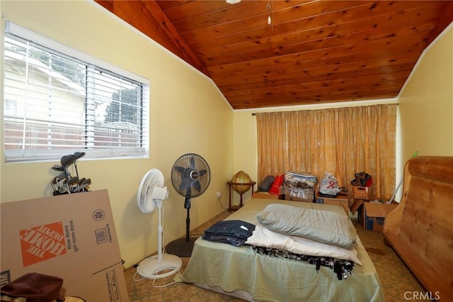 carpeted bedroom featuring lofted ceiling and wooden ceiling