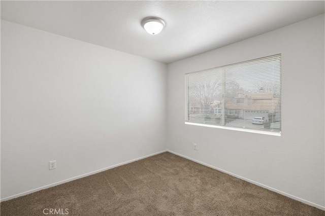 view of carpeted spare room