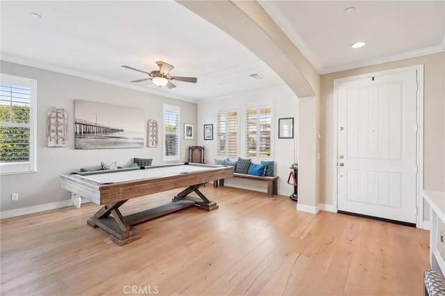 rec room with ceiling fan, billiards, ornamental molding, and light hardwood / wood-style floors