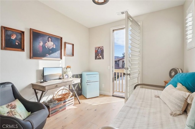 bedroom featuring light hardwood / wood-style floors