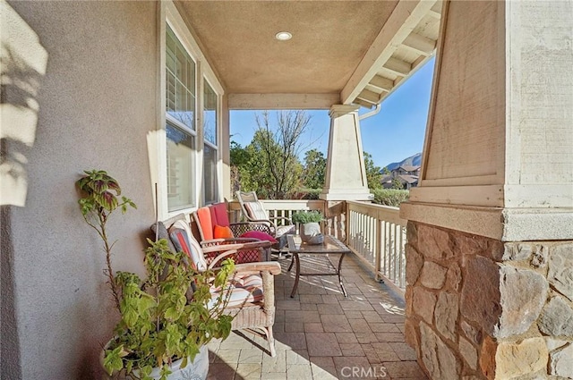 balcony featuring a porch