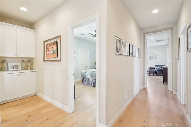 hall featuring light hardwood / wood-style flooring