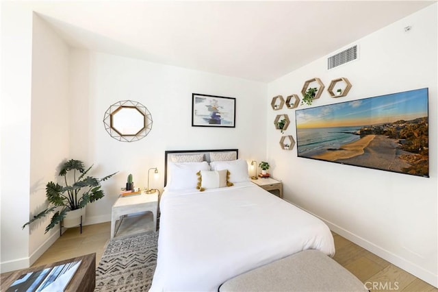 bedroom featuring light wood-type flooring