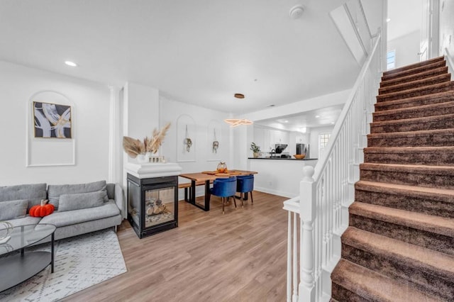 living room featuring light wood-type flooring