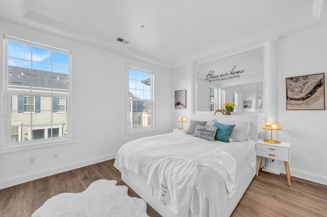 bedroom featuring wood-type flooring