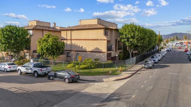 view of building exterior with a mountain view