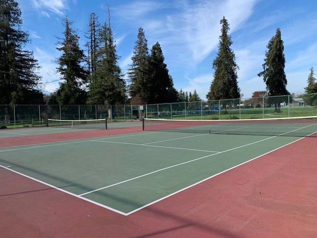 view of tennis court with basketball court