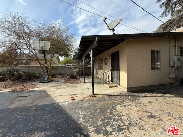 view of home's exterior featuring a patio area