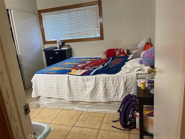 bedroom with tile patterned flooring