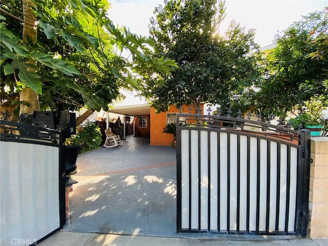 view of gate featuring fence