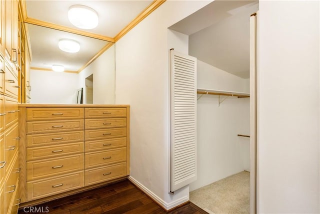 interior space with hardwood / wood-style flooring and ornamental molding