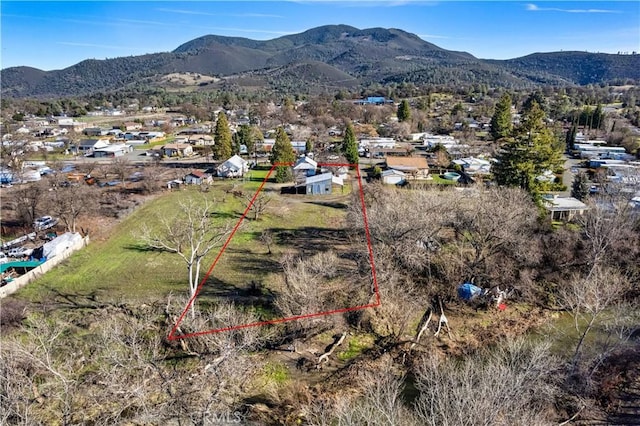 bird's eye view with a mountain view