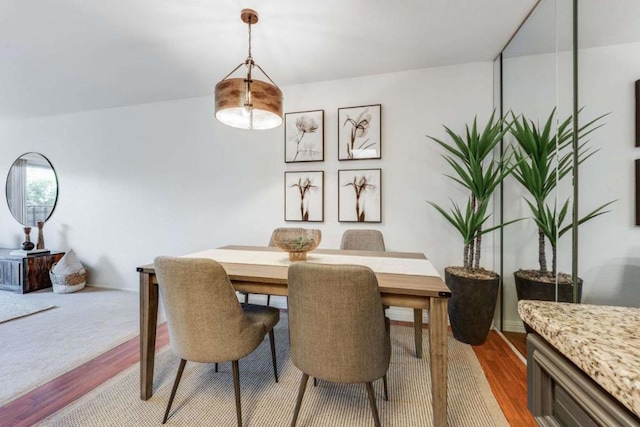 dining space featuring light hardwood / wood-style flooring