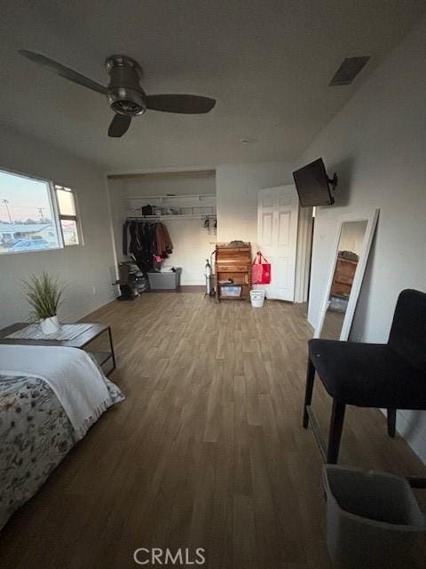 bedroom featuring ceiling fan and hardwood / wood-style floors