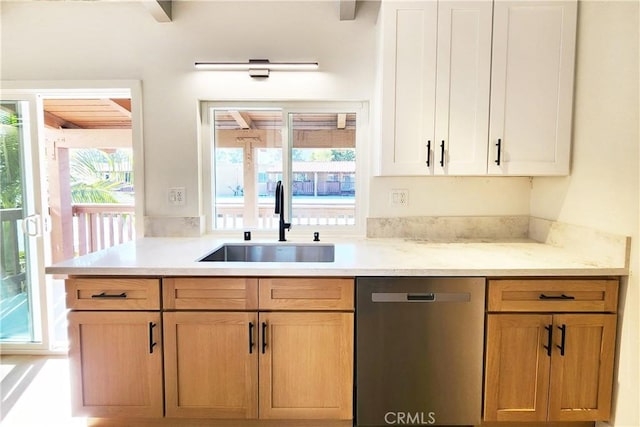 kitchen featuring dishwasher and sink