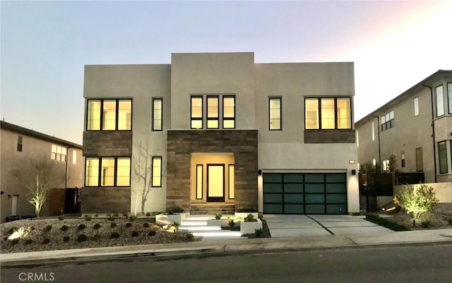 view of front of property featuring a garage