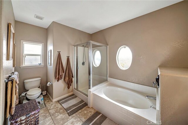 bathroom with separate shower and tub, tile patterned floors, and toilet