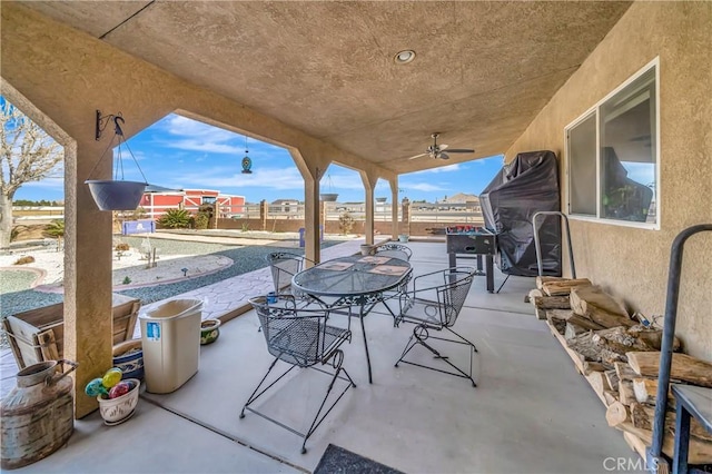 view of patio with ceiling fan