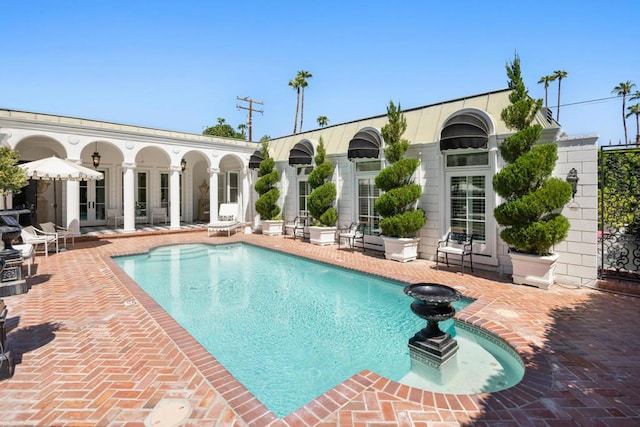 view of pool with a patio