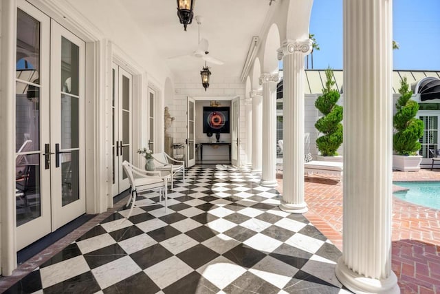 exterior space featuring ceiling fan and french doors