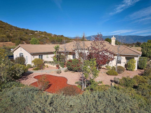 exterior space featuring a mountain view