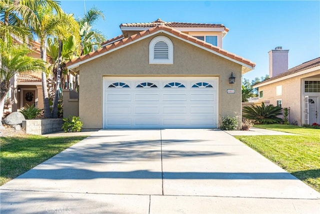 mediterranean / spanish-style home with a front lawn