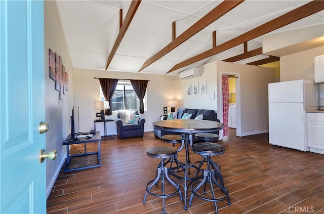 dining area with a wall unit AC and lofted ceiling with beams